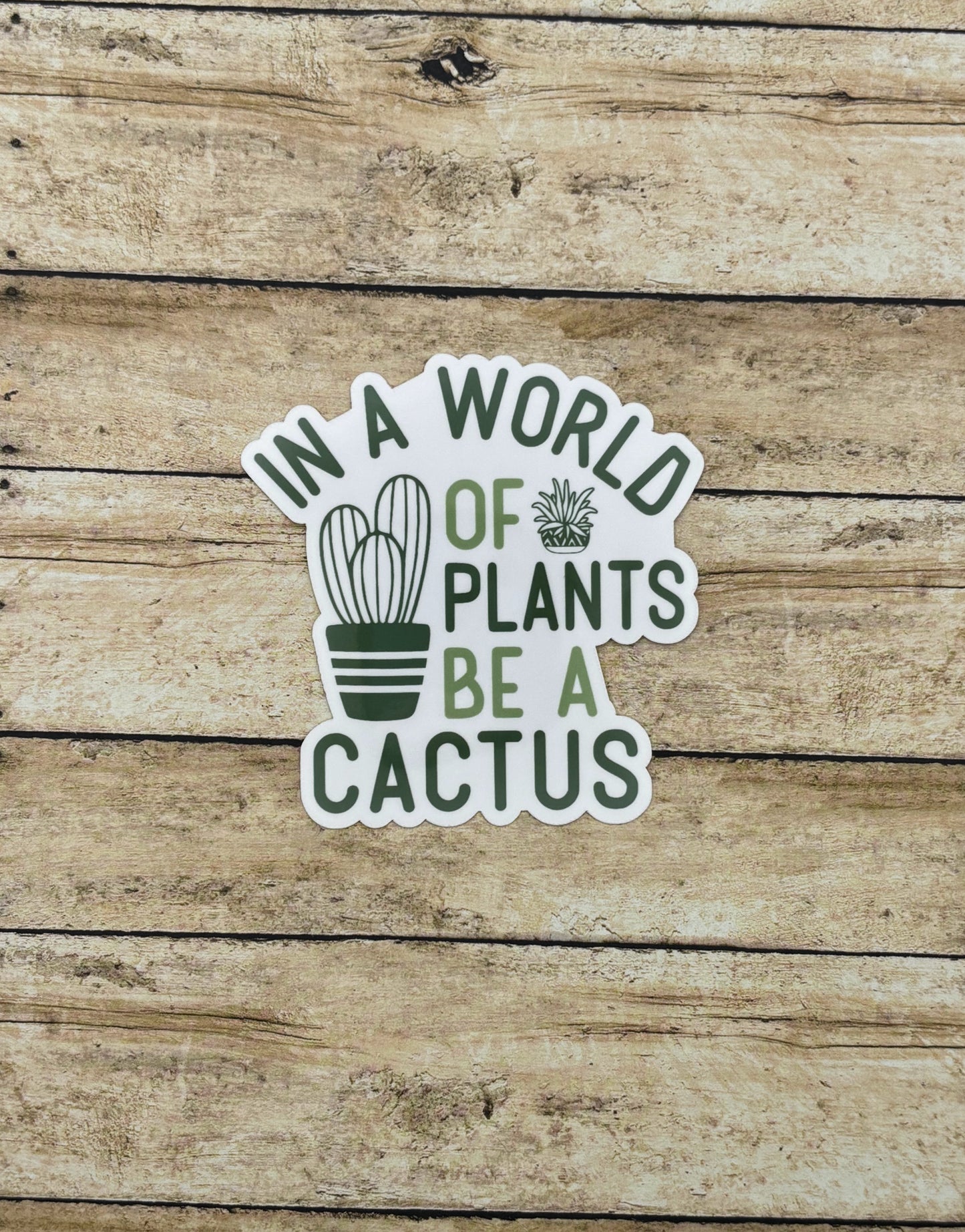 In a world of plants be a cactus Sticker